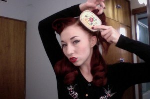 Brushing hair up in a 45-degree angle. 