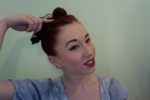 Fold these all pack, and use hair pins horizontally where I'm pointing to hold this in place.