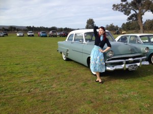 Posing in front of a beautiful car 